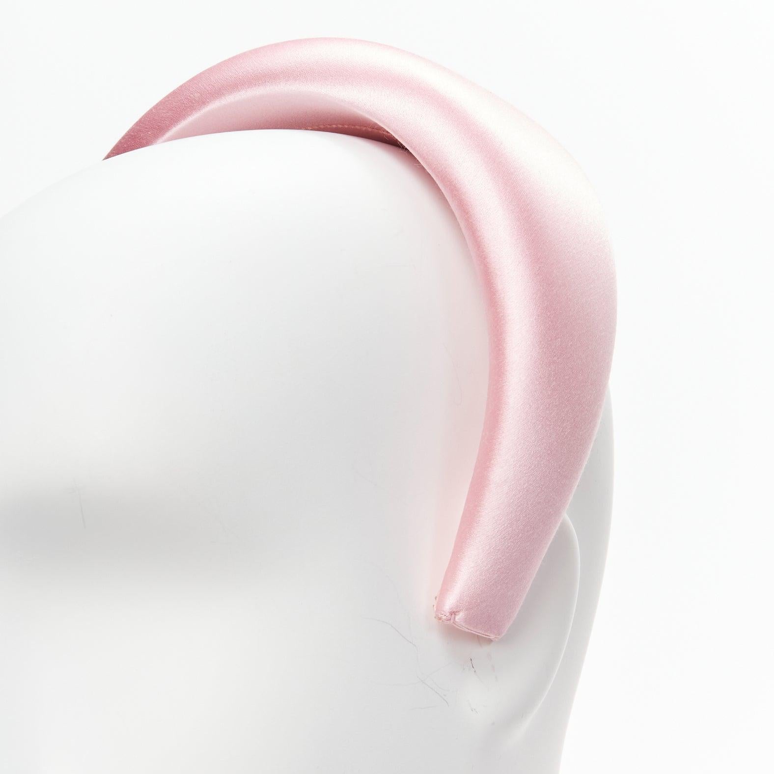 PRADA Alice light pink satin oversized padded puffy headband
Reference: BSHW/A00126
Brand: Prada
Designer: Miuccia Prada
Collection: Runway
Material: Fabric
Color: Pink
Pattern: Solid
Lining: Pink Fabric

CONDITION:
Condition: Very good, this item