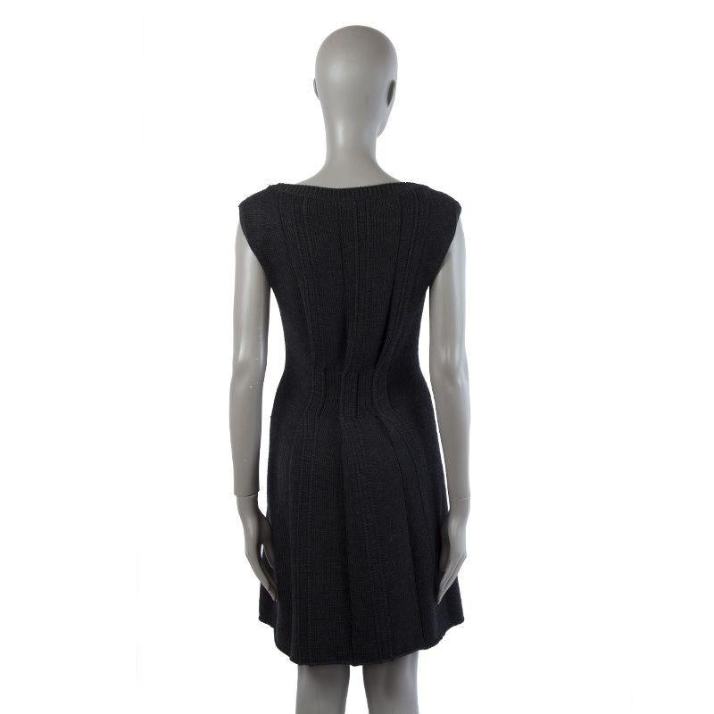 Prada knit sleeveless knee-length boat neck dress in anthracite wool (100%). Has been worn and is in excellent condition.

Tag Size 40
Size S
Shoulder Width 42.5cm (16.6in)
Bust 88cm (34.3in) to 110cm (42.9in)
Waist 72cm (28.1in) to 84cm