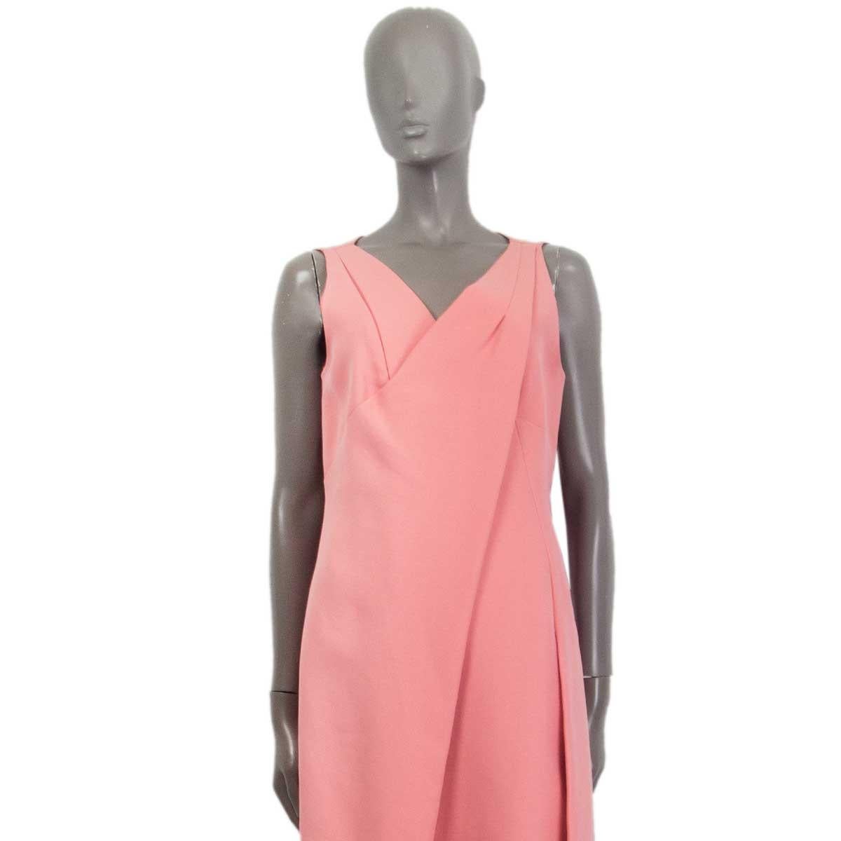 100% authentic Prada knee-length sleeveless draped dress in baby pink cotton (100%). Opens with a concealed bow zipper on the back. Partly lined at front. Has been worn and is in excellent condition. 

Tag Size 44
Size L
Shoulder Width 35cm