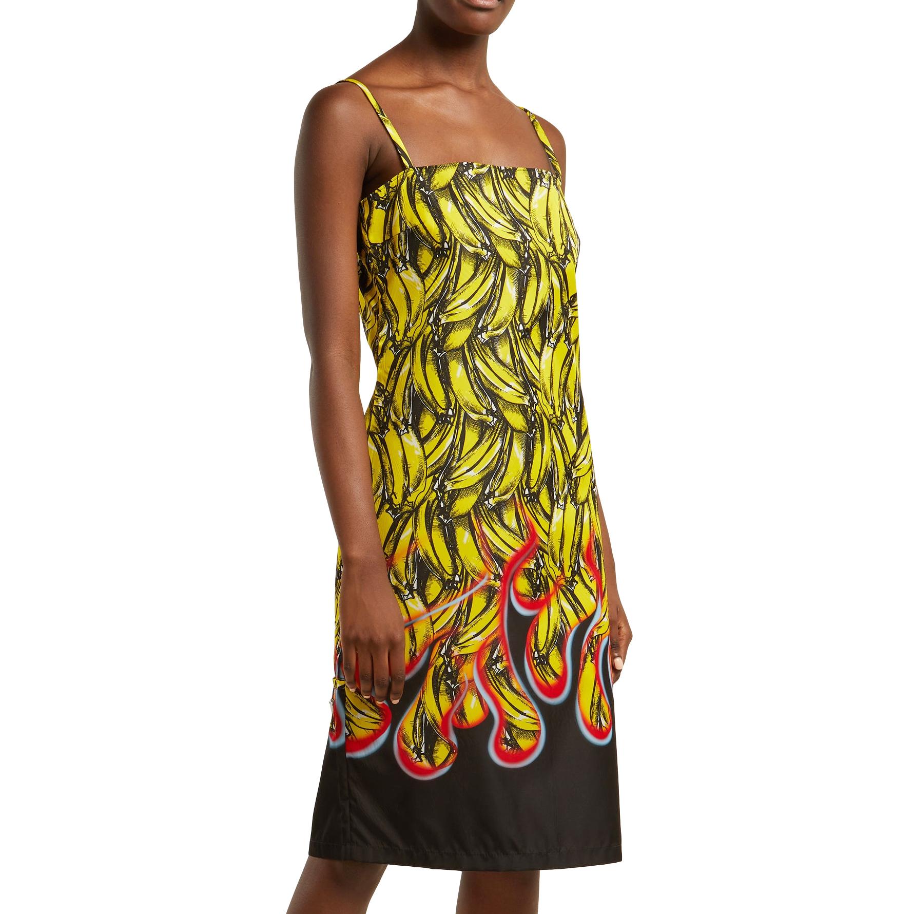 Prada Banana & flame-print gabardine dress

The contemporary art inspired Prada has a deep enduring heritage that cements the brands legendary status. This multicolour banana flame print midi dress features spaghetti straps, a straight neck, a