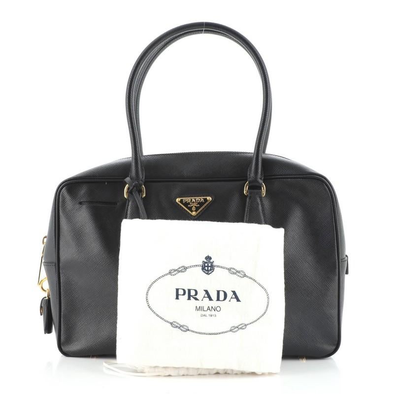 Condition: Very good. Odor in interior. Slight stiffness on zipper track. Minor wear on base corners and handles, creasing on exterior. Splitting on handle base wax edges, scratches and tarnish on hardware.
Accessories: Clochette, Lock,