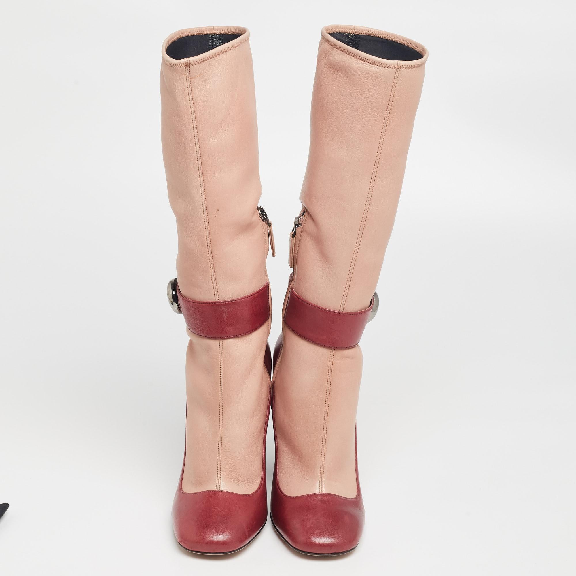This pair is designed to project an effortless luxe style. These boots by Prada are crafted from quality materials into a refined silhouette. They are equipped with stylish closure, comfortable insoles, and a sturdy sole for lasting wear. Pair them