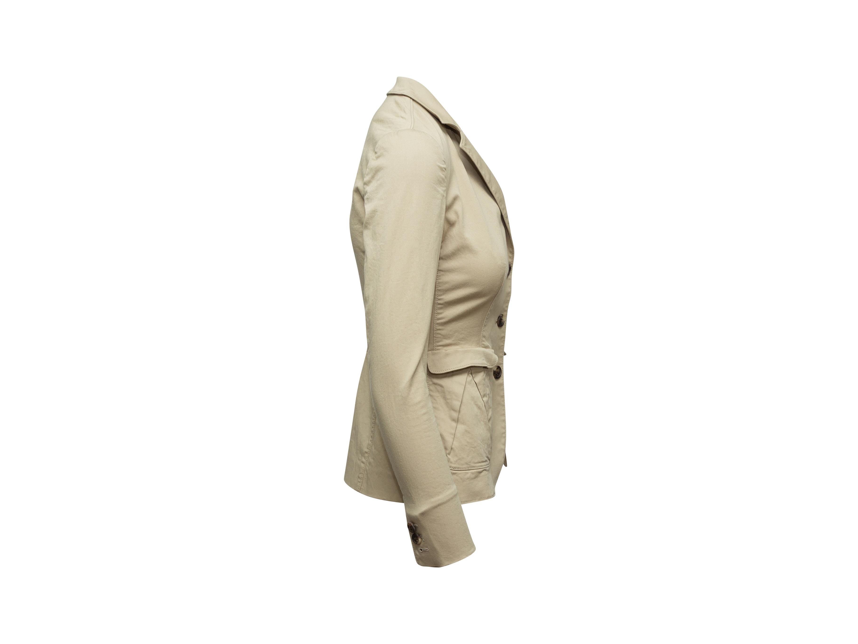 Product details: Beige cotton blazer by Prada. Notched collar. Three pockets. Button closures at center front. Designer size 40.
Condition: Pre-owned. Very good.
Est. Retail $ 795.00