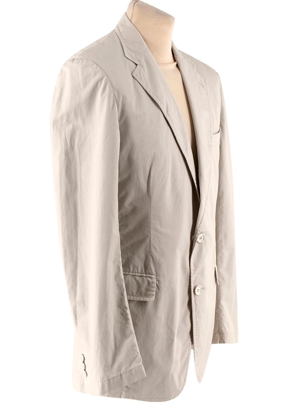 Prada Beige Cotton Single Breasted Blazer Jacket 

-Made of soft fresh cotton 
-Classic cut 
-Gorgeous beige neutral hue 
-Button fastening to the front 
-Buttoned cuffs 
-Vents to the back 
-3 pockets to the front 
-2 interior pockets 
-Timeless