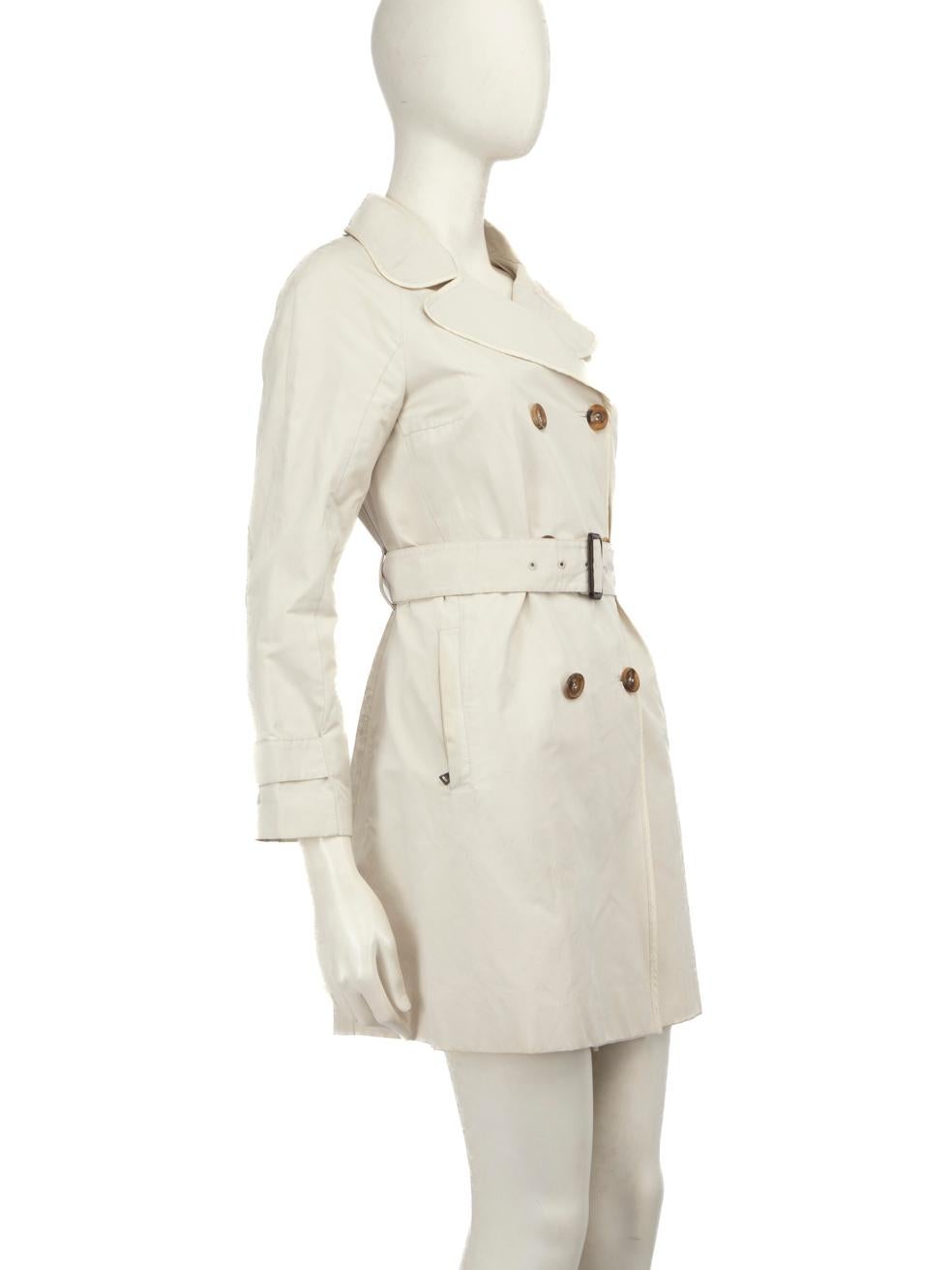 CONDITION is Good. General wear to coat is evident. Discolouration marks are evident in several areas especially on the left panel, marks are located near the bust, at the waist, and close to the pockets and hemline. The right panel shows