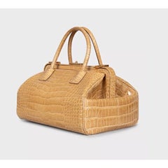 Prada Beige Leather Handbag with Animal Print and Gold Hardware