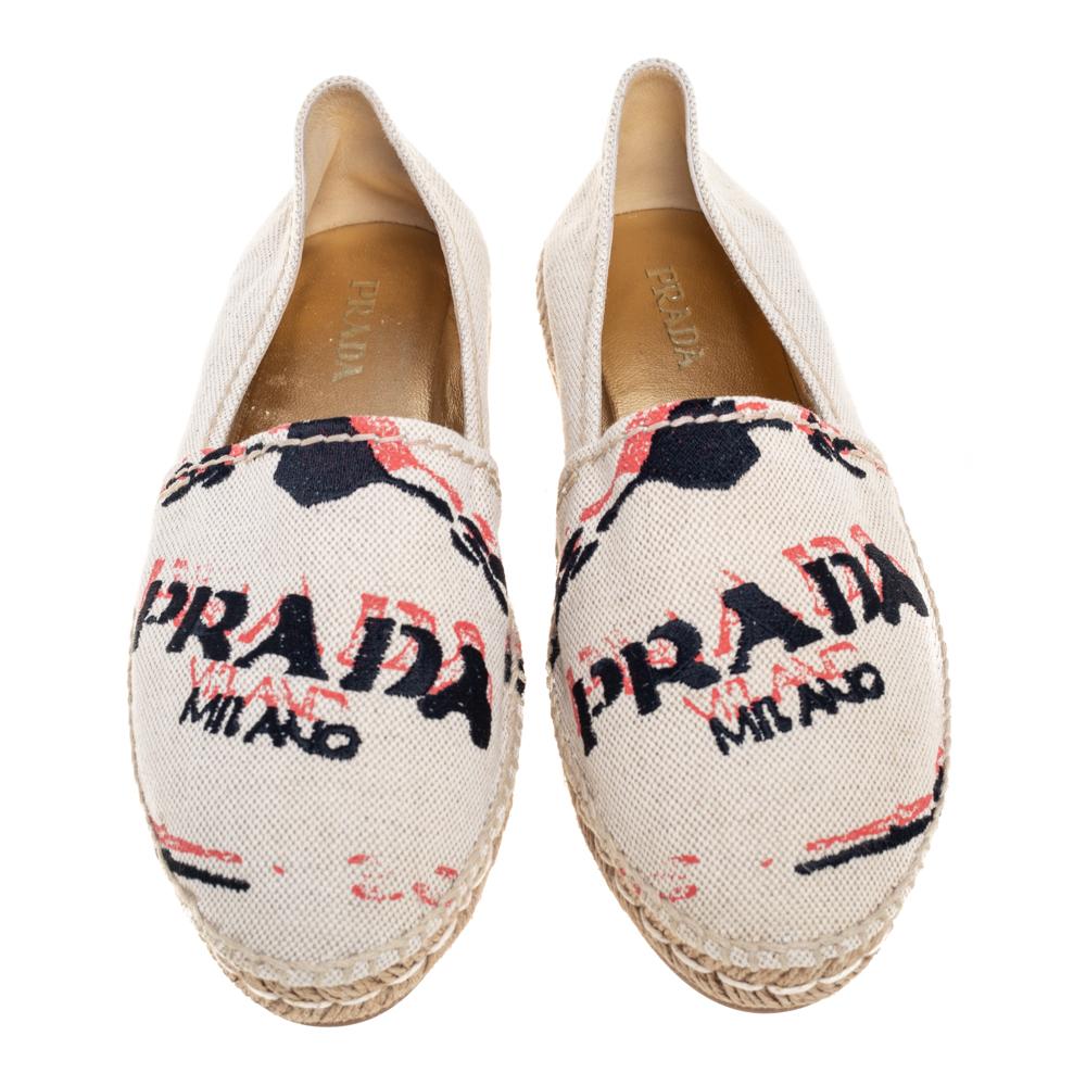Espadrilles are not just stylish, but also comfy and easy to wear. This lovely pair of Prada espadrilles will accompany a casual outfit perfectly. The shoes are made of canvas and designed with logo embroidery.

Includes: Original Dustbag

