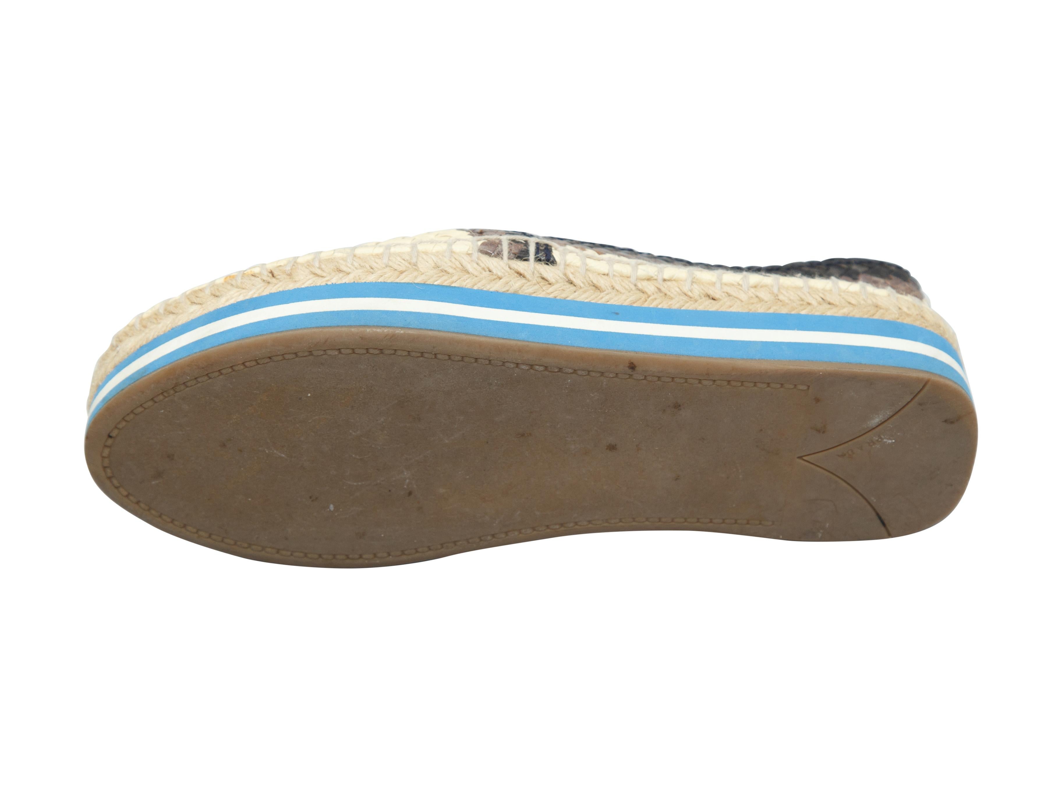 Product details: Beige and multicolor woven raffia espadrilles by Prada. Flatform soles. Designer size 35.5. 1.13