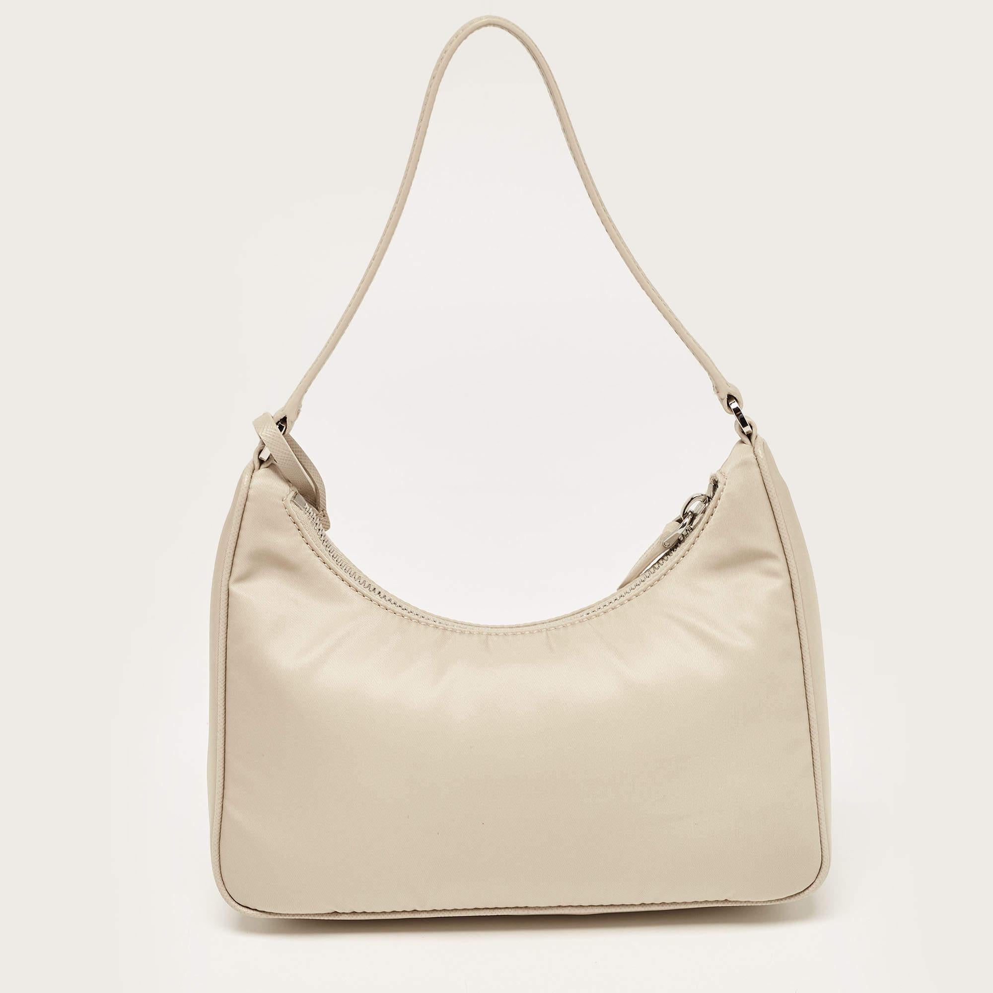 Prada Re-edition 2000 shoulder bag will shine and sparkle from every angle at every step you take. It is a stunning work of art you can parade by hand.

Includes: Original Dustbag

