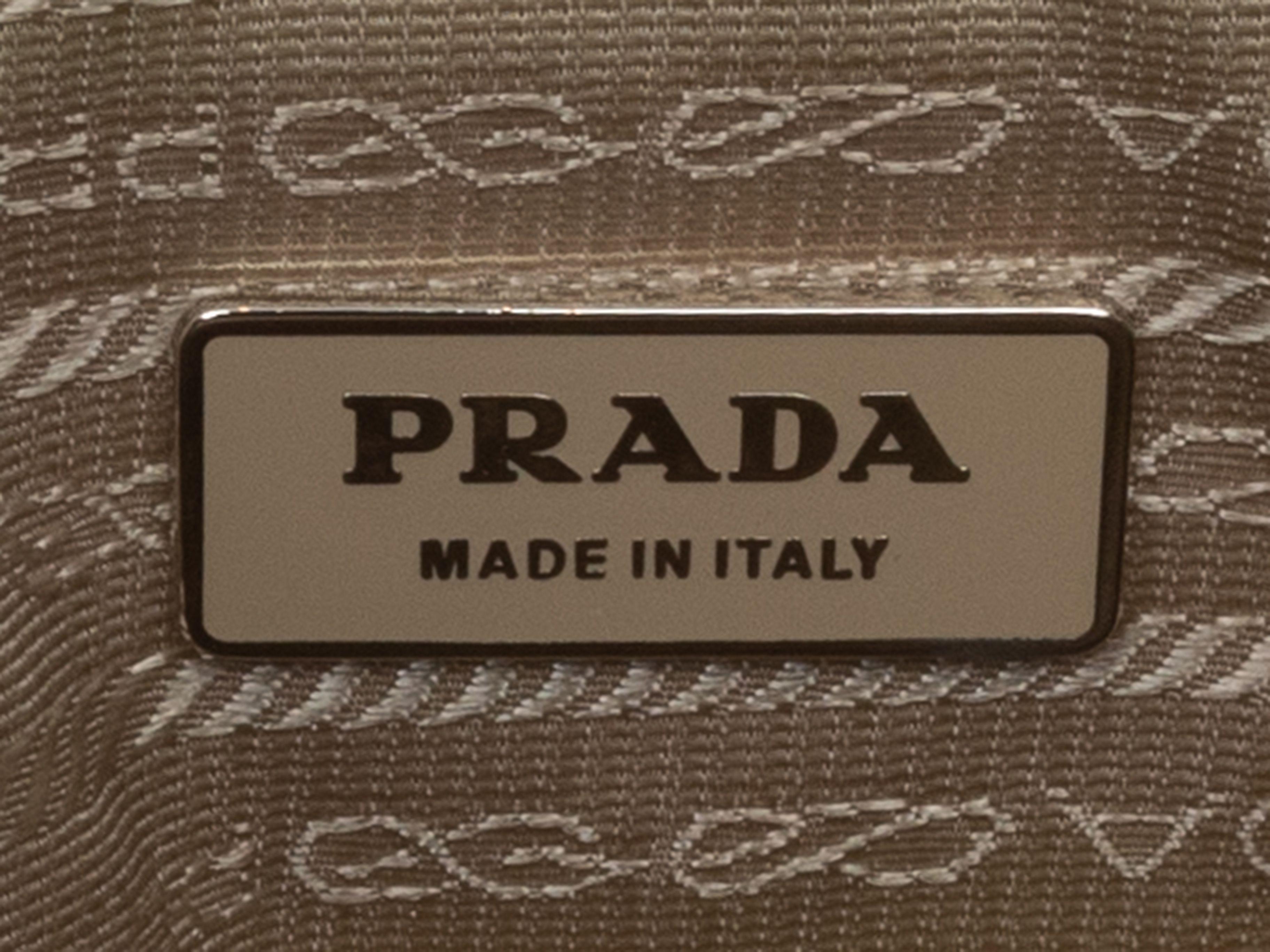 Product Details: Beige Prada Nylon Waist Bag. This waist bag features a nylon body, silver-tone hardware, leather trim, dual exterior front pockets, an adjustable waist strap, and a top zip closure. 10.5