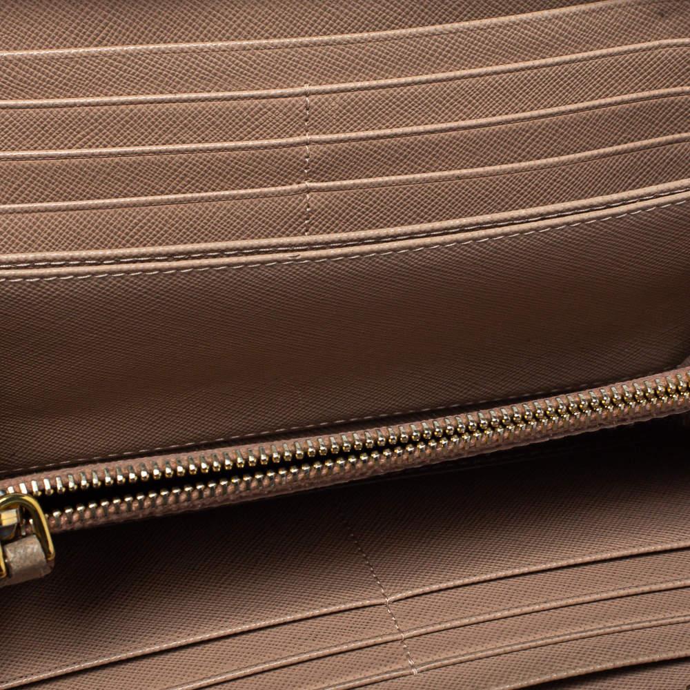 Prada Beige Saffiano Leather Bow Zip Around Wallet In Fair Condition In Dubai, Al Qouz 2