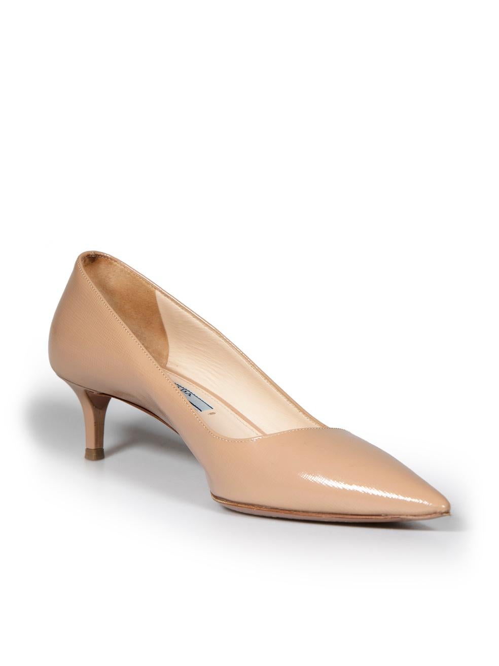 CONDITION is Very good. Minimal wear to pumps is evident. Minimal wear to soles and heel tips. There is and indent to the right shoe heel, and a small mark to the outer side on this used Prada designer resale item.
 
 
 
 Details
 
 
 Beige
 
