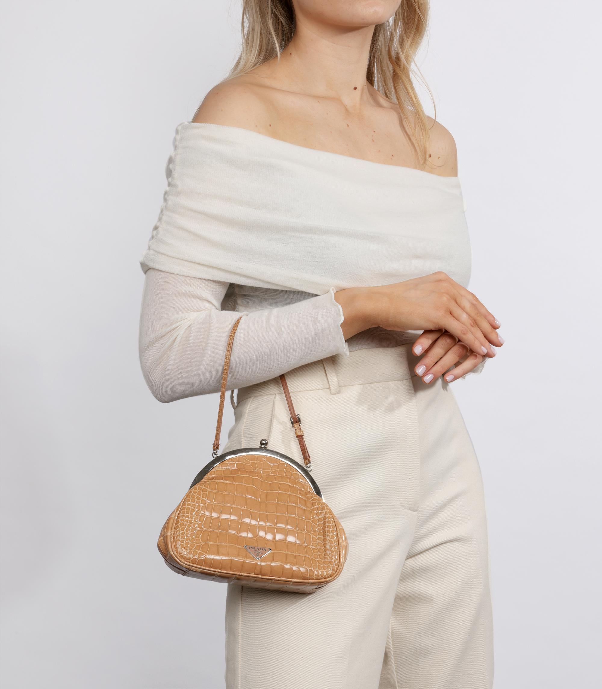 Prada Beige Shiny Alligator Leather Vintage Mini Frame Top Handle

Brand- Prada
Model- Mini Frame Top Handle
Product Type- Top Handle
Serial Number- **
Accompanied By- Prada Dust Bag, Mirror
Colour- Beige
Hardware- Silver
Material(s)- Shiny