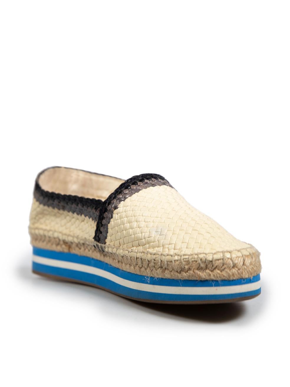 CONDITION is Good. General wear to espadrilles is evident. Moderate signs of wear to insoles with discolouration marks, marks are also evident on the collar and on inner back counters of both shoes. Discolouration to the uppers and sides on the left