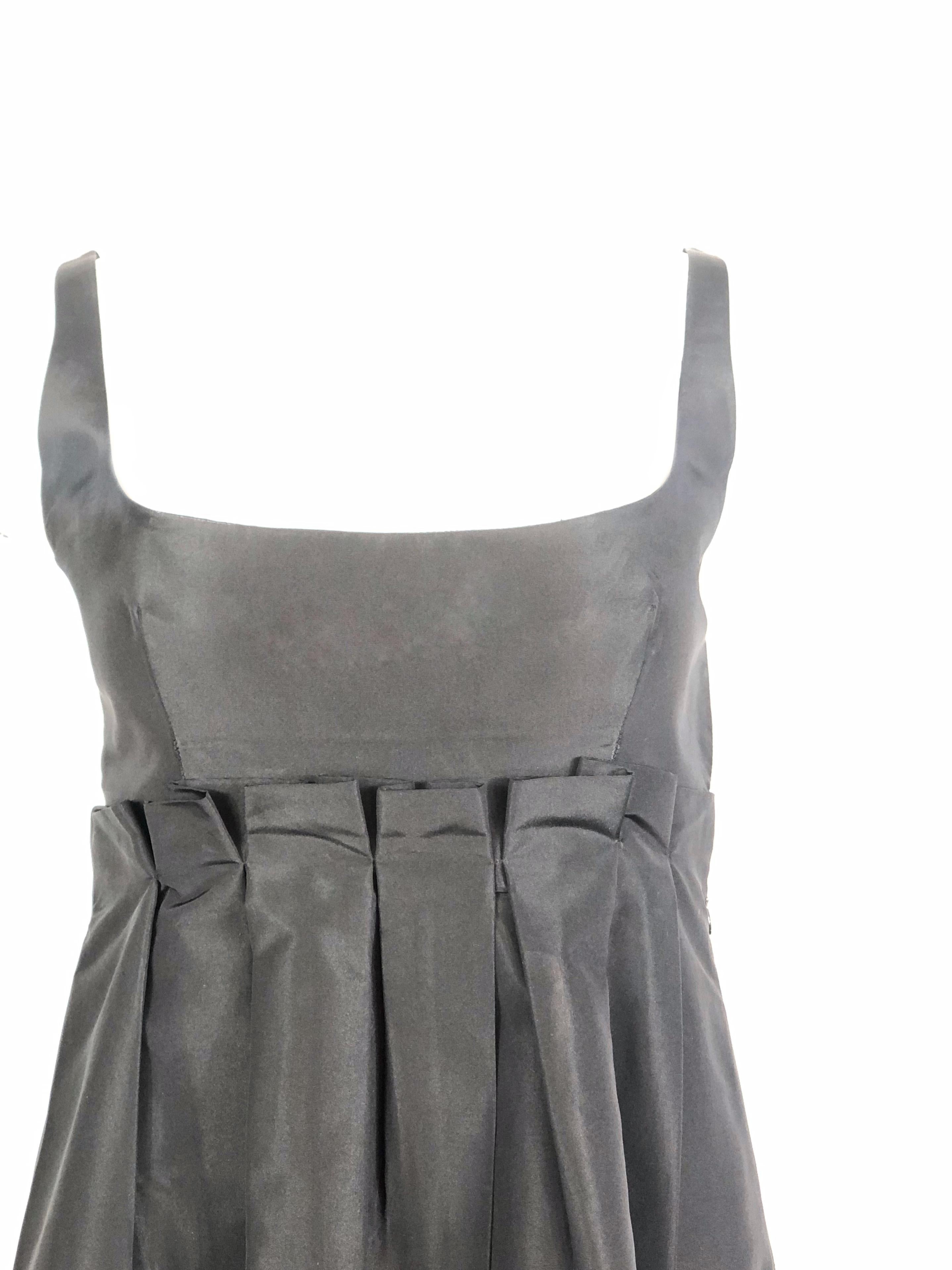 PRADA Black Babydoll Sleeveless Mini Dress Size 42

Product details:
Size 42
Side zipper and hook closure 
Made in Italy
