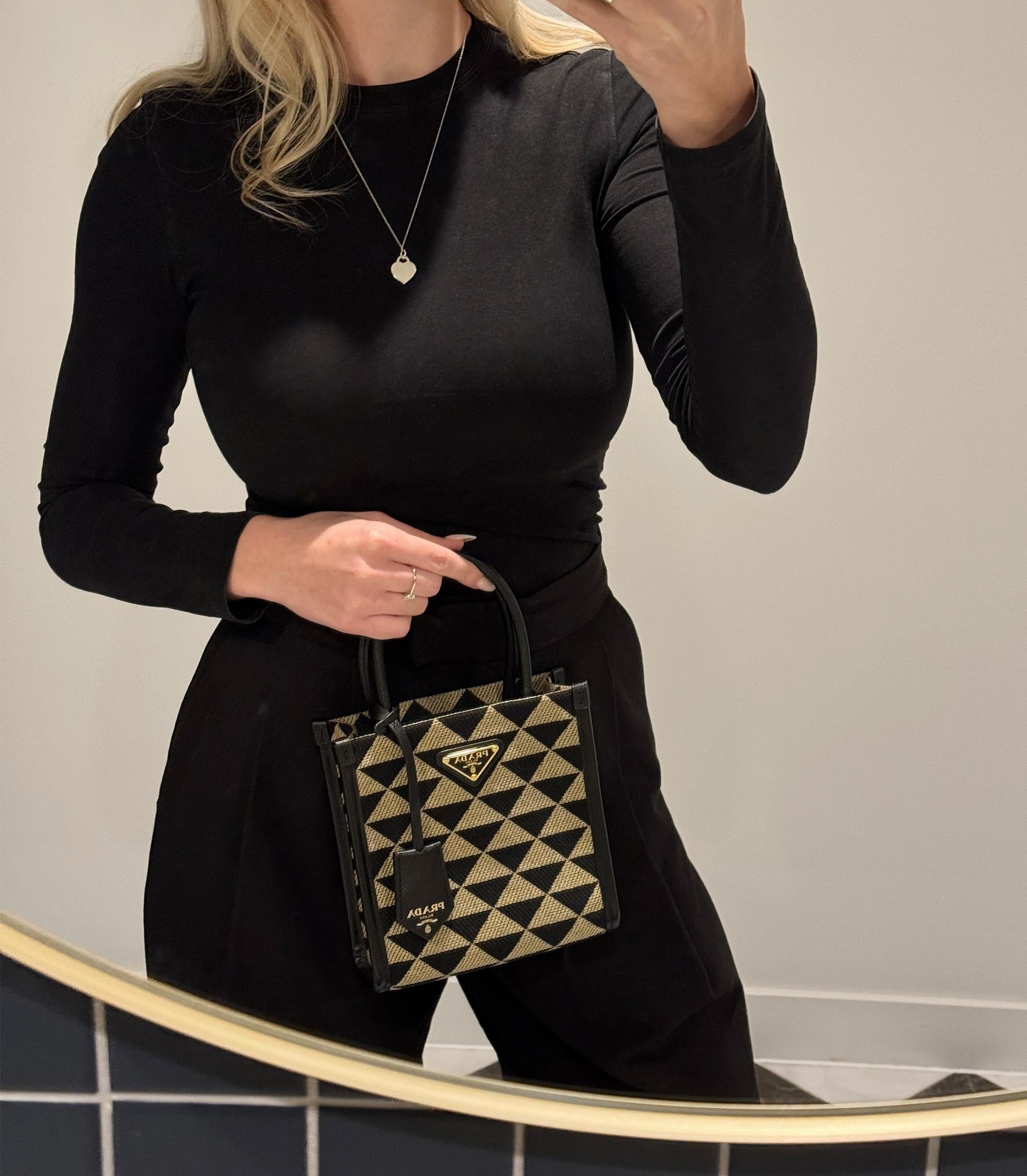 Prada Black, Beige Embroidered Canvas & Black Saffiano Leather Mini Symbole

Product Details
Xupes Ref: CB1521
Brand: Prada
Model: Small Symbole
Type: Tote, Shoulder, Crossbody
Serial Number: 7
Age: 2022
Accompanied By: Prada Dust Bag, Shoulder