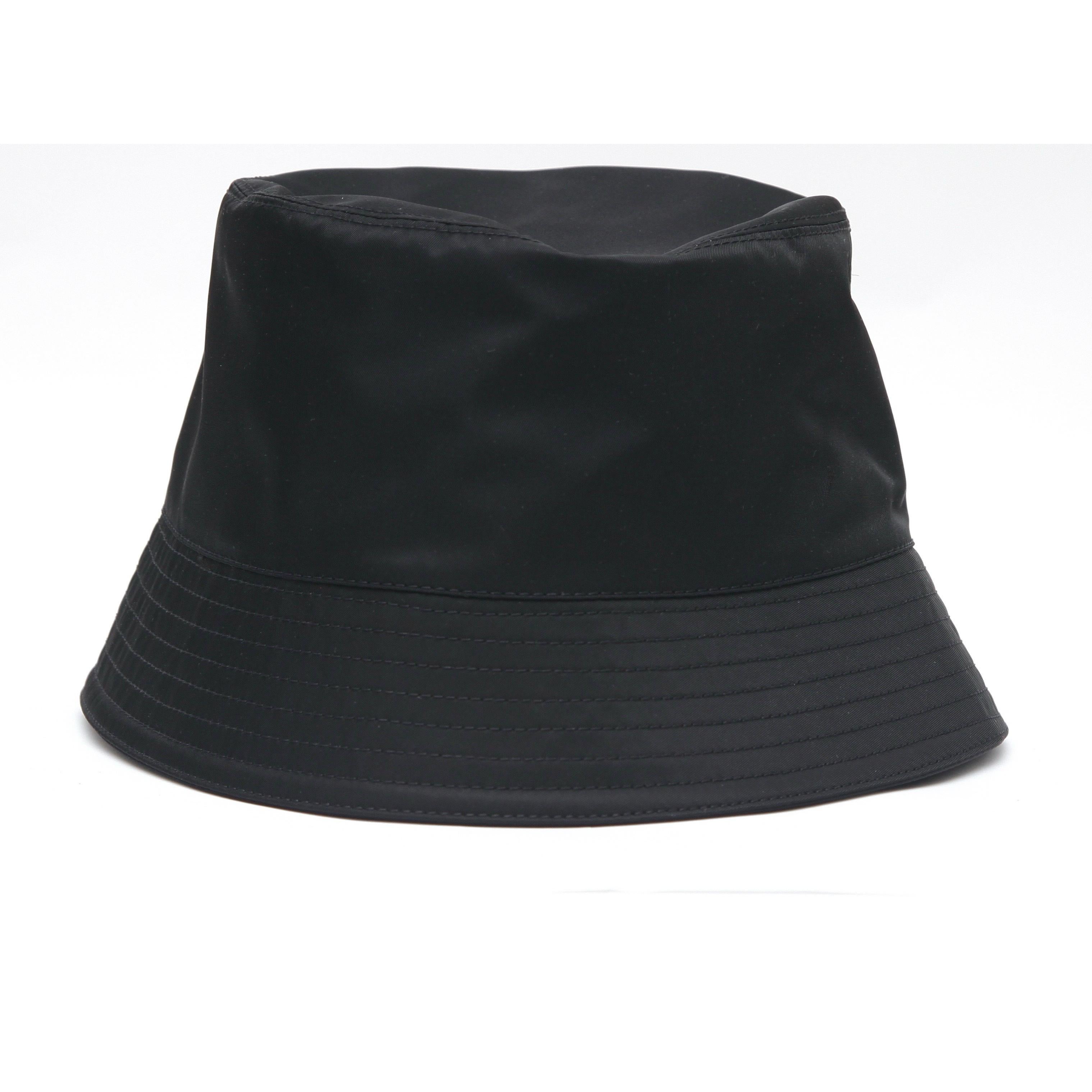 GUARANTEED AUTHENTIC PRADA BLACK RE-NYLON BUCKET HAT

Excluding sales taxes, $695

Design:
• Black re-nylon.
• Enameled metal triangle logo.
• Brim.
• Comes with Prada dust bag, product cards.

Material: 100% Re-Nylon, Lining Cotton

Size: M

To Our