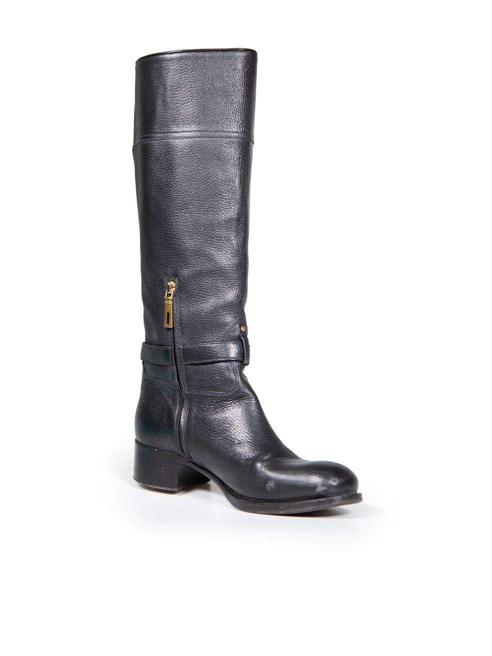 CONDITION is Good. Minor wear to boots is evident. Wear to soles with some light scratches and abrasions to the sides of the shoe on this used Prada designer resale item.
 
 Details
 Black
 Calfskin leather
 Knee high boots
 Round toe
 Low block