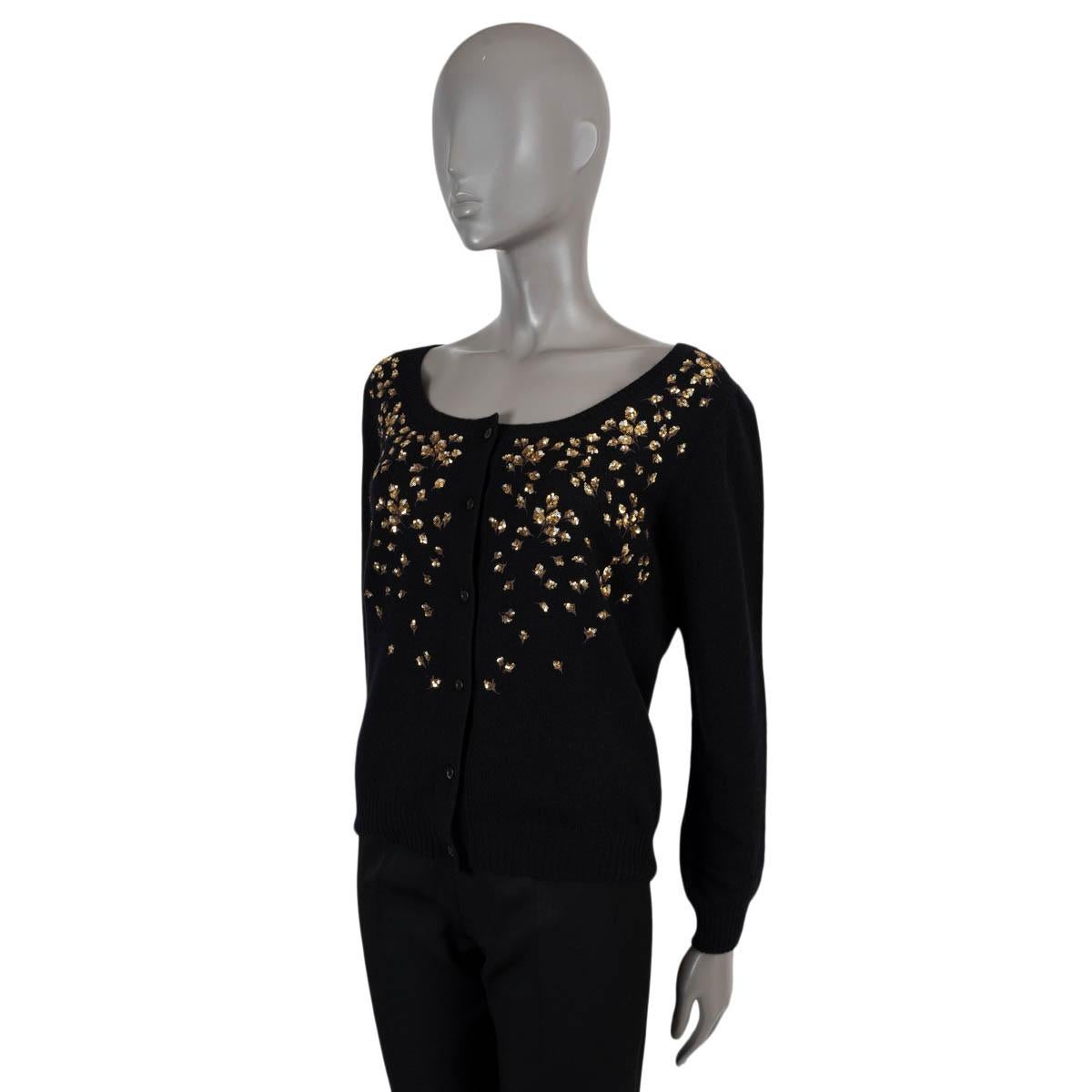 100% authentic Prada cardigan in black cashmere (100%). Features gold floral sequin embellishments, a scoop neck and rib-knit cuffs and hem. Closes with buttons on the front. Has been worn and is in excellent condition.

Measurements
Tag