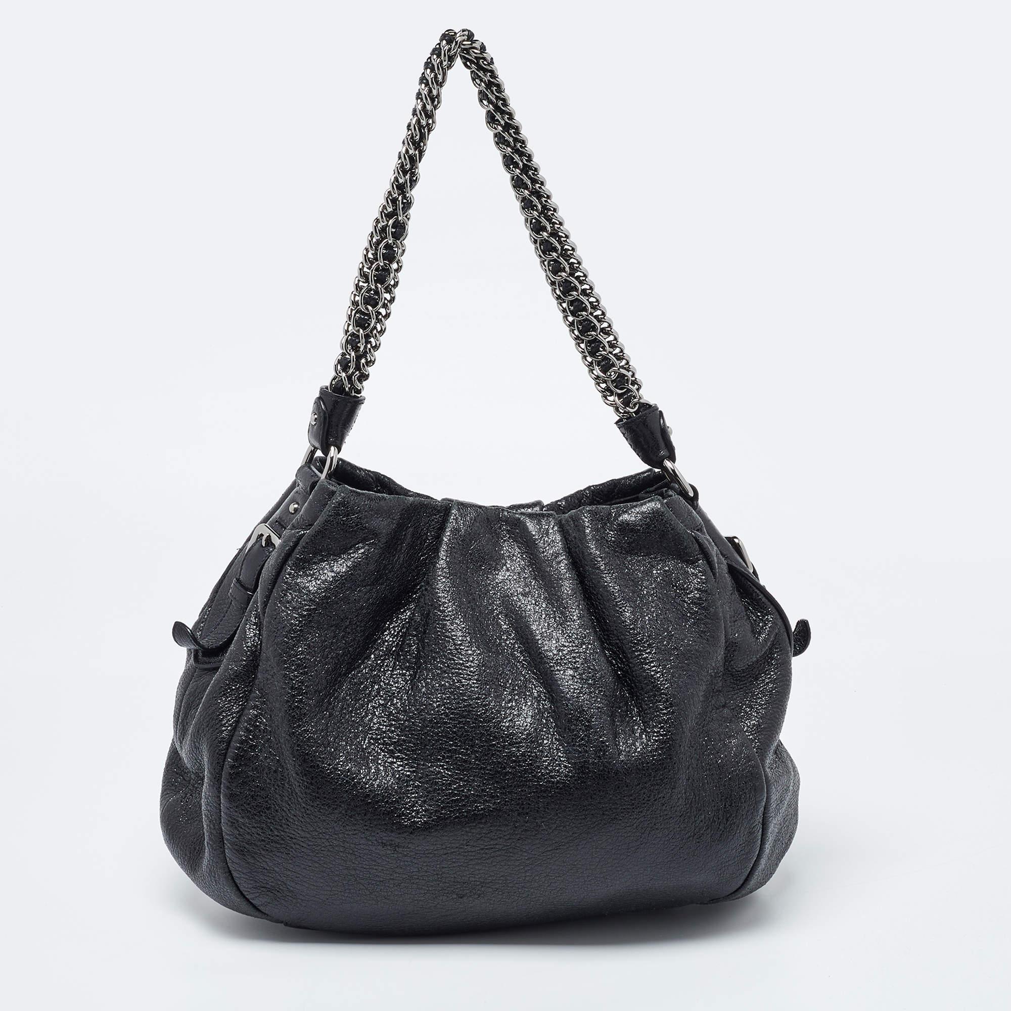 Stylish handbags never fail to make a fashionable impression. Make this designer hobo yours by pairing it with your sophisticated workwear as well as playful casual looks.

Includes: Original Dustbag