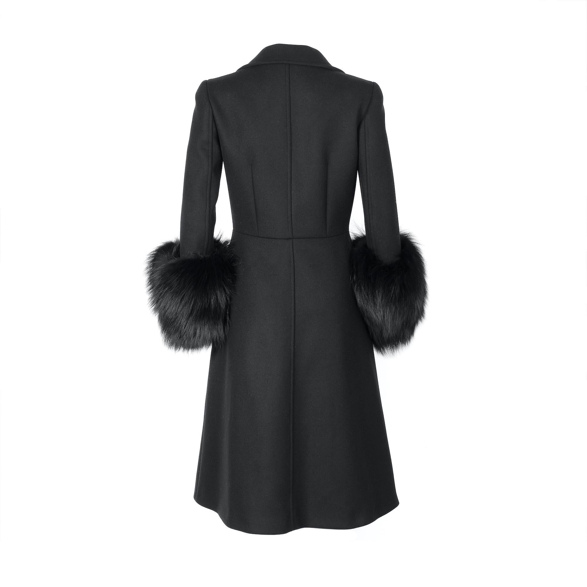 * Wool Blend
* 5 Button Closure
* Classic Collar
* Fur cuffs
* A-Line Fit
* Excellent Condition: This pre-owned piece has almost no signs of wear.

Please note that most items we carry have been previously owned unless marked as ‘unworn’. Unless