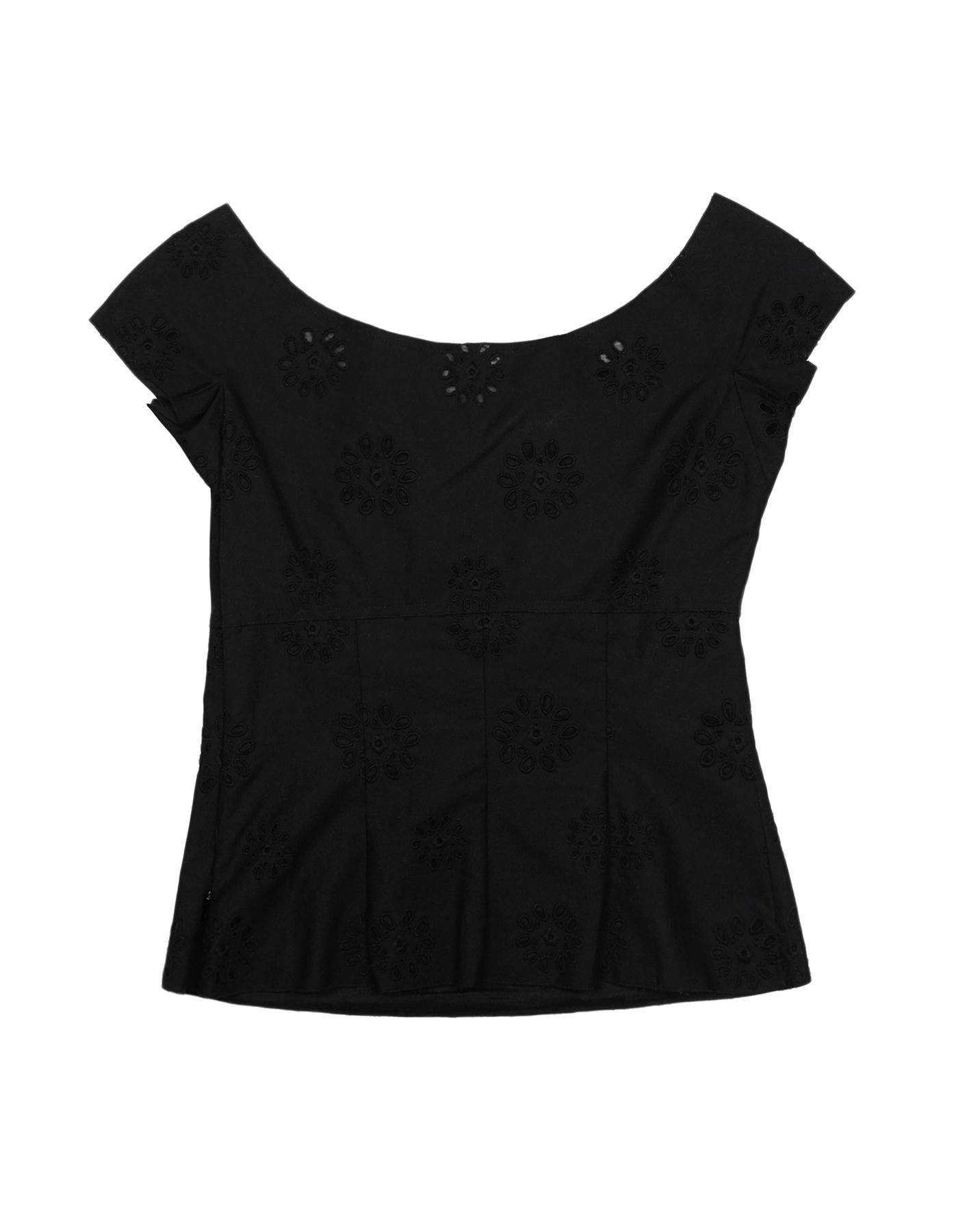Prada Black Cotton Eyelet Cap Sleeve Top Sz 38

Made In: Italy
Color: Black
Hardware: Black
Materials: 100% cotton
Closure/Opening: Hidden side zipper
Overall Condition: Excellent pre-owned condition 

Measurements: 
Bust: 28