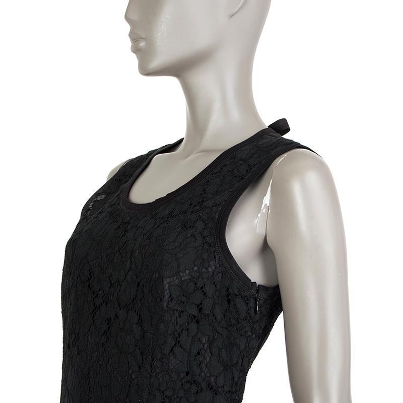 Prada lace sheath dress in black cotton (70%), viscose (20%), and nylon (10%). With crew neck and keyhole back that ties at the back with satin ribbon. Lined in black satin. Has been worn and is in excellent condition. 

Tag Size 42
Size M
Shoulder