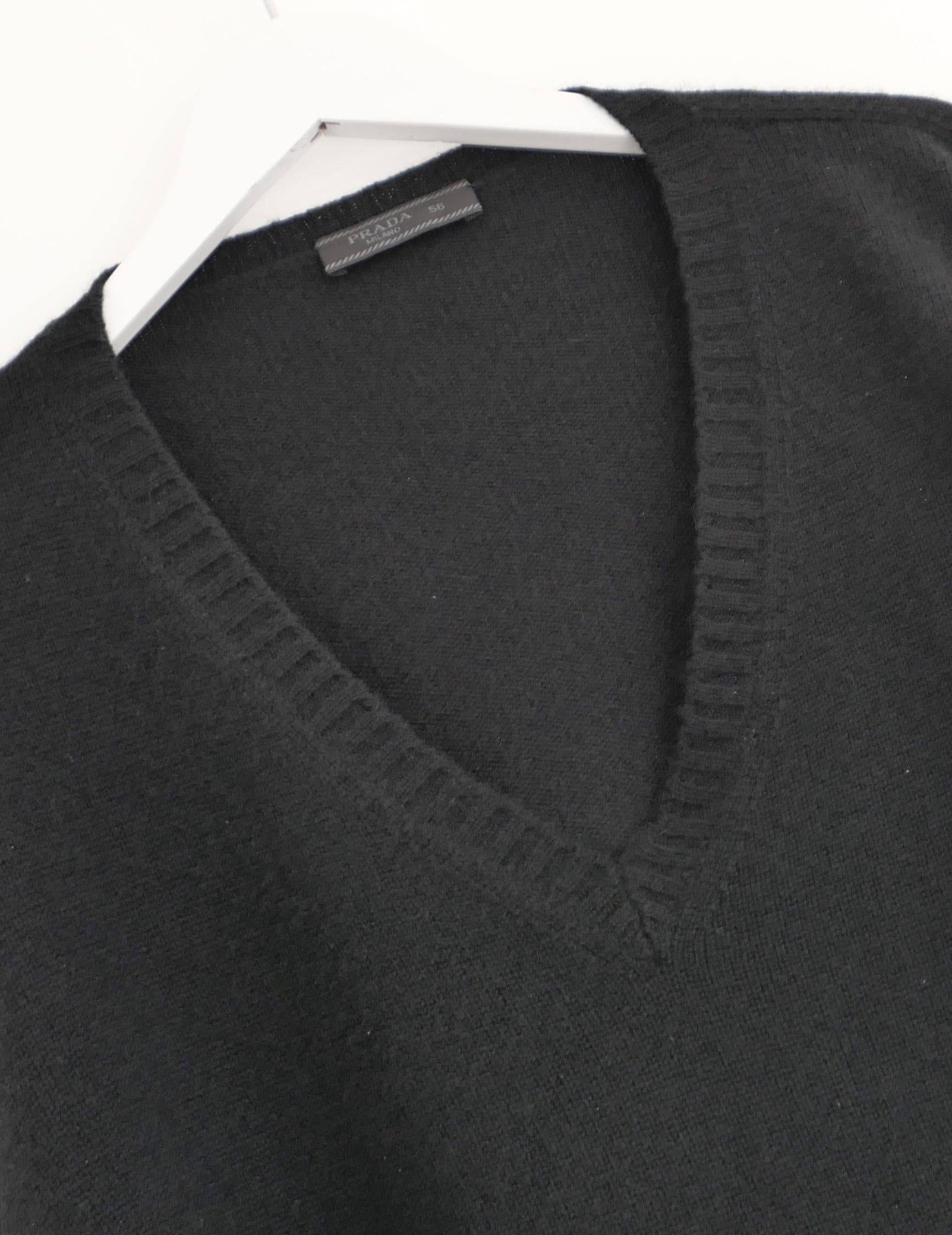 Gorgeous Prada cashmere sweater. In excellent condition but is missing composition label. Price reflects this. Made from ultra soft mid weight black cashmere, it has deep v neck and a regular fit. Size 56. Measures approx - chest 48”, length 29”.
