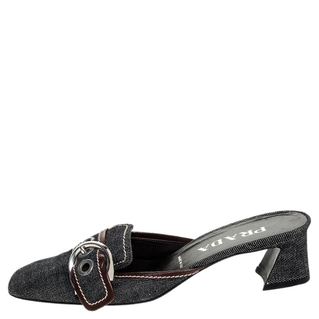 Walk in these Prada mules for maximum style and comfort. Crafted from denim and lined with leather on the insoles, this pair comes wonderfully shaped into square toes and lifted on block heels. You can team them up with your casual outfits for a