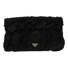 Prada - Pochette en tessiture plissée avec diamants noirs