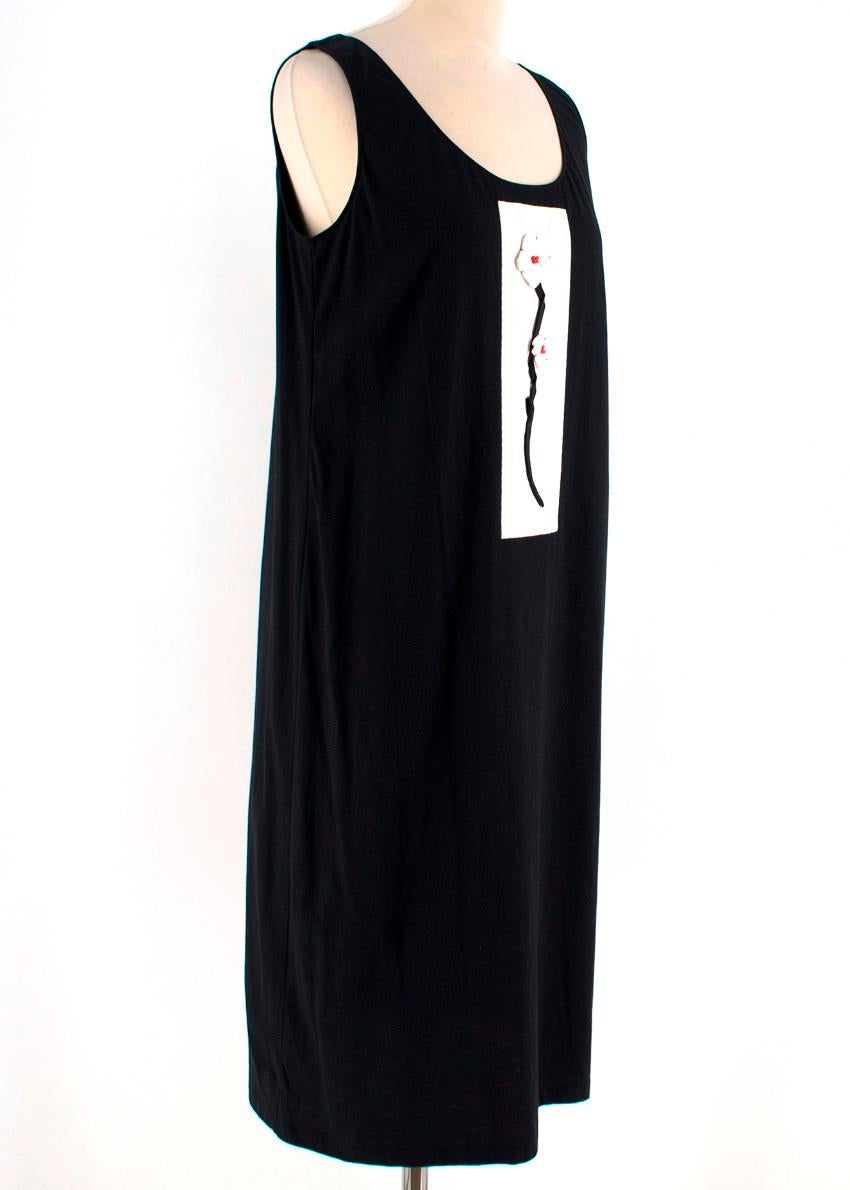 Prada black dress featuring a round neckline, a mid-length and an embroidered flower to the front. 

- Sleeveless design
- Straight fit

Please note, these items are pre-owned and may show signs of being stored even when unworn and unused. This is