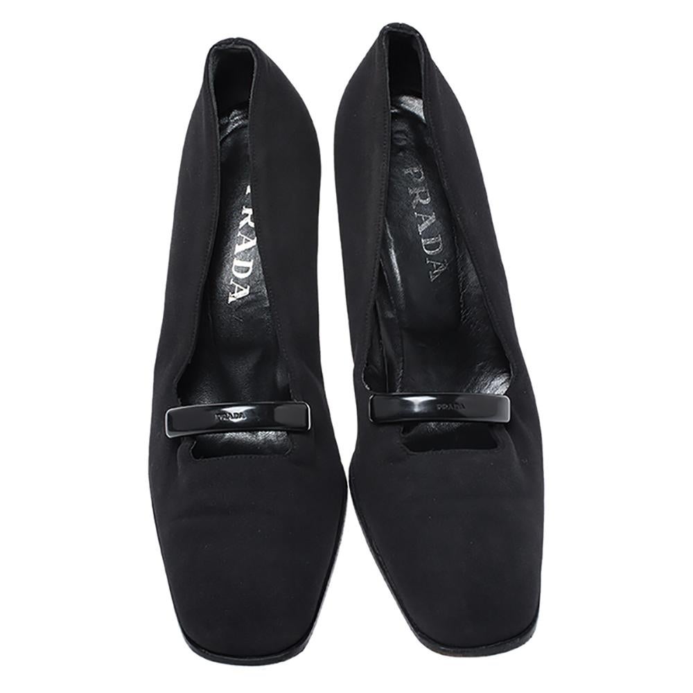 black fabric dress pumps