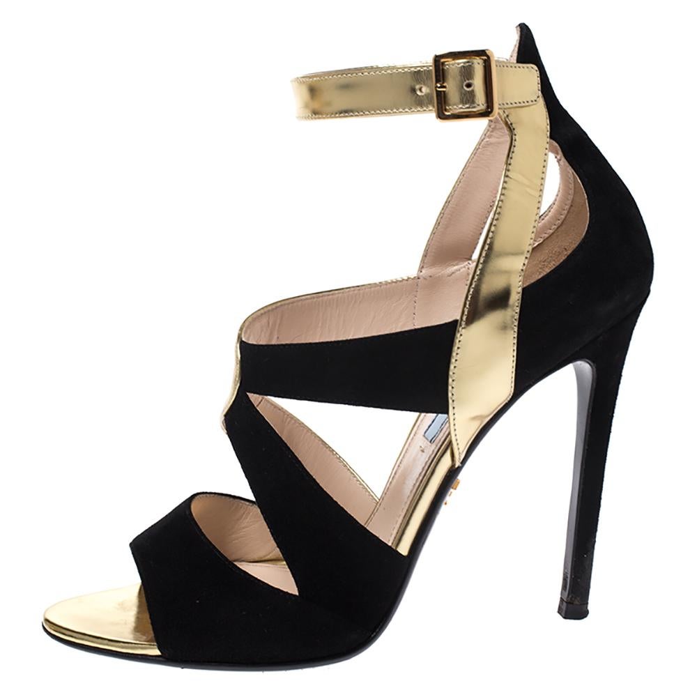 We have our hearts set on these sandals from Prada. This black-gold pair has been crafted using leather and suede and designed with cutouts that create a strappy design on the vamps. They also feature ankle buckle closure and 11.5 cm heels. Take