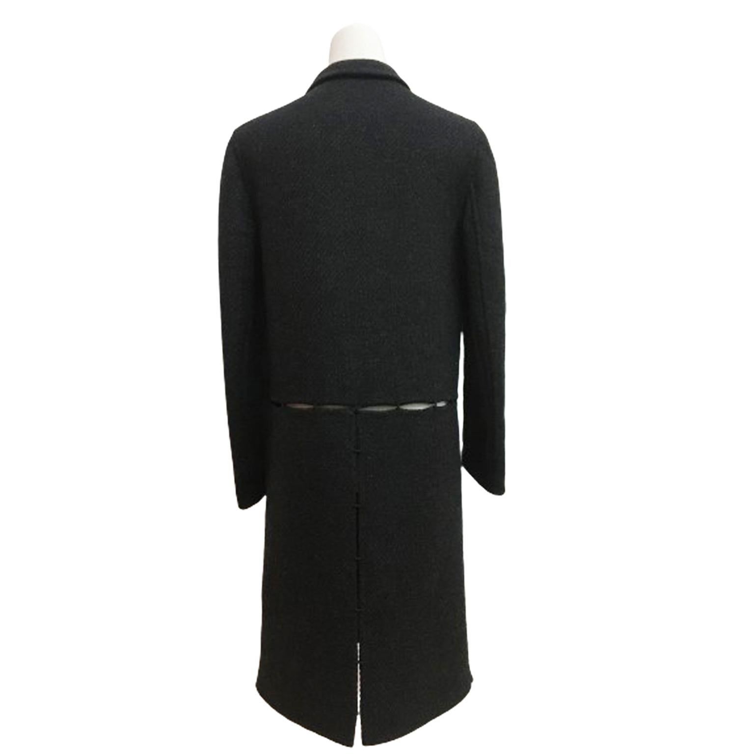 Beautiful Prada wool Black / dark grey wool coat from circa 1990s.
Super forward architectural design. 
Front and back - horizontally divided as stripes and they are conjuncted with strong yarns. 
No lining, snap buttons closure. 
Size  : 38 IT
