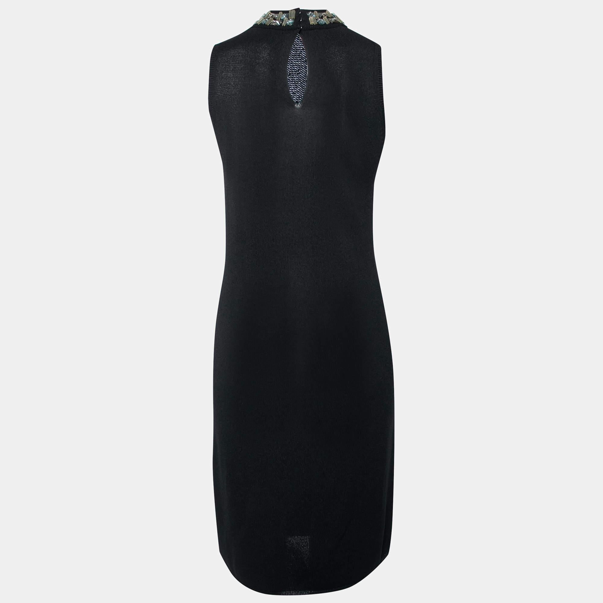 This simple and elegant black dress from Prada is perfect for those special occasions. It is stitched from knit fabric and features an embellished neck detail. Wear the sleeveless dress with high heels and a statement clutch.

