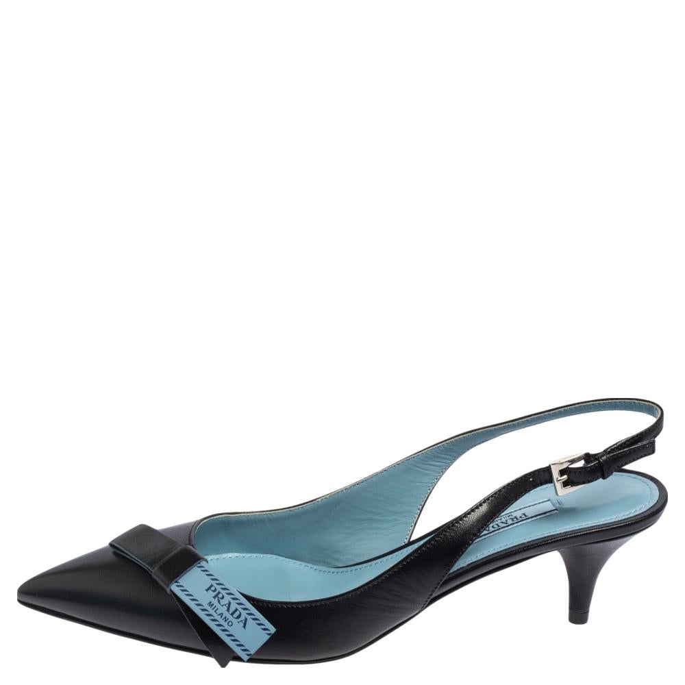 Comfort comes to you in the form of these sandals from Prada. They are crafted from leather and feature bow details on the uppers, buckle slingbacks, and 6 cm heels. The black sandals will be great for fashionable days out.

Includes: Original Box,