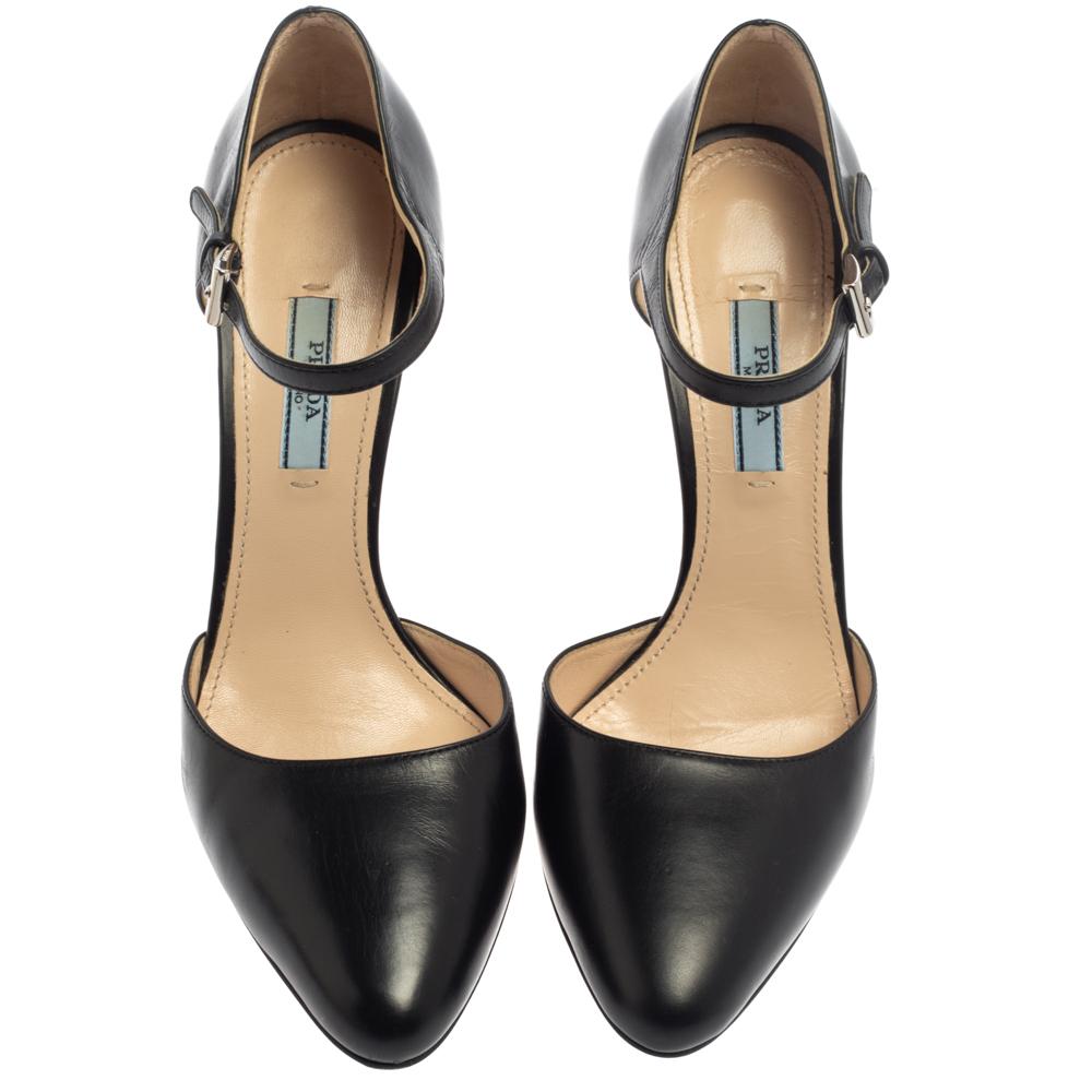 These exquisite pumps from Prada are worth splurging on. Crafted in luxurious leather, these pumps flaunt almond toes, ankle fastenings, and 11.5 cm heels. They come with comfortable leather-lined insoles and are sure to lend your personality oodles