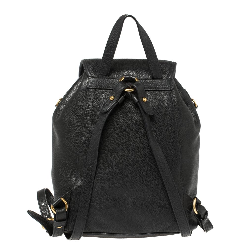 This Prada backpack promises to take you from day to night and weekday to weekend. The exquisite design of this black-hued backpack adds a classic finish to your overall look. It is prepared from quality leather and opens to a spacious nylon-lined