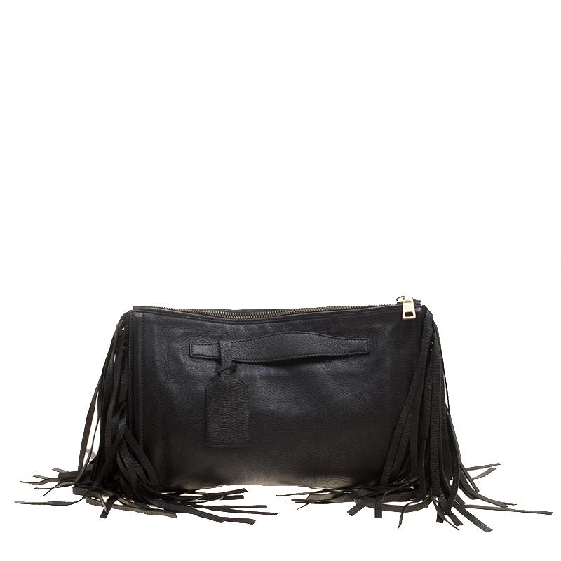 This lovely fringe clutch from Prada is crafted with black leather into a structured shape. It is adorned with leather fringe details on each side. The top zip closure leads to a leather-lined interior that houses a zipped pocket and brand label