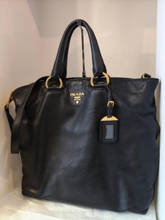 Prada black leather gold hardware shoulder handle bag