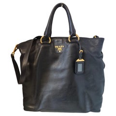 Prada black leather gold hardware shoulder handle bag
