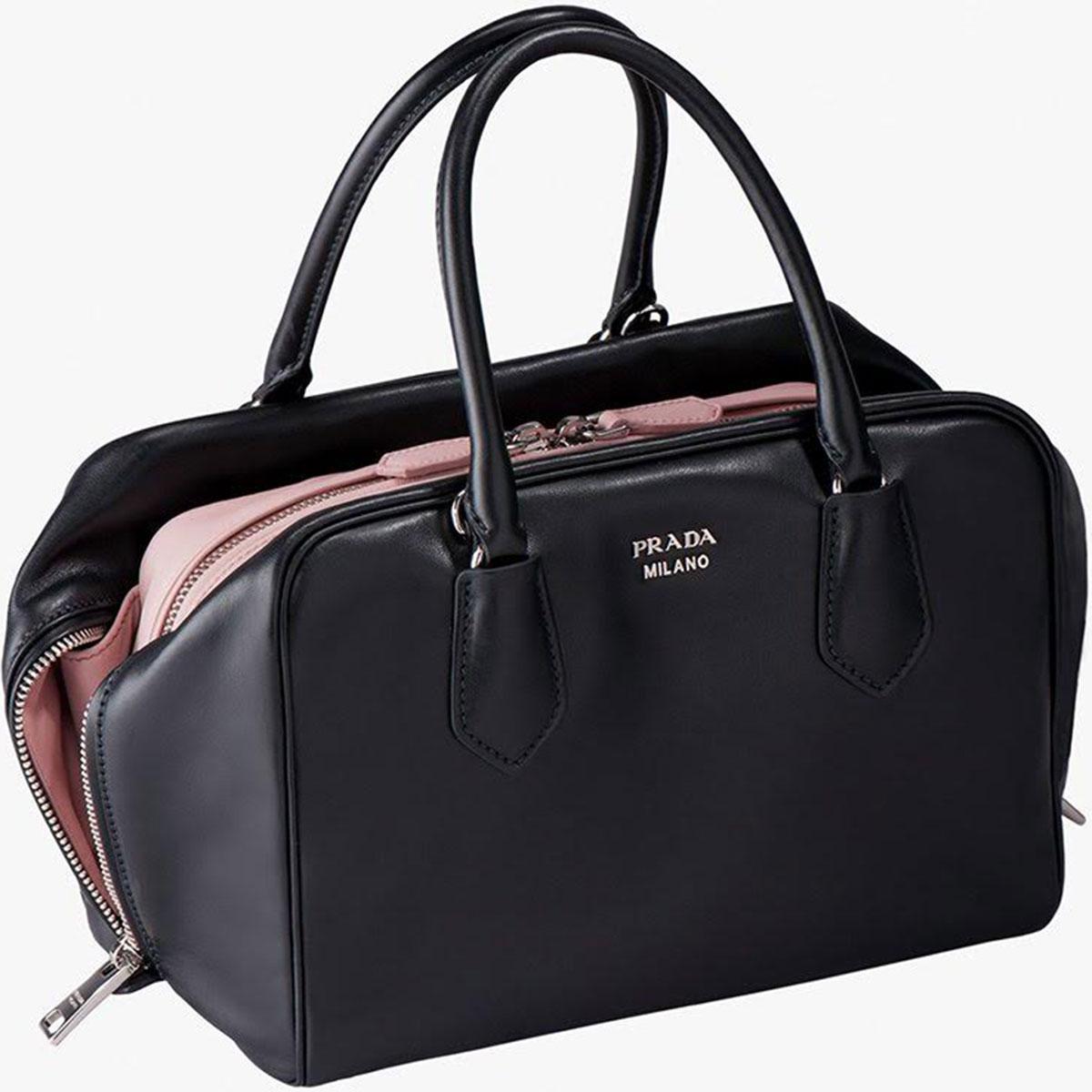 100% authentic Prada Medium Inside bag in black smooth leather with a dirty rose leather inside bag and lining. The inner bag is joined through two folds to the outer, without any internal frame. Each section is handcrafted, which takes many hours