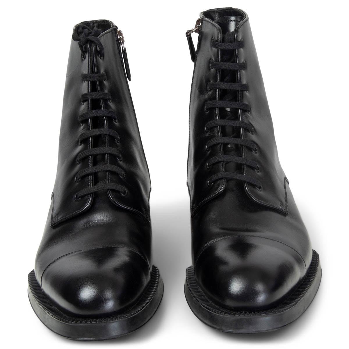 100% authentic Prada lace-up ankle boots in black smooth leather and rubber sole. Open with a zipper on the inside. Have been worn and are in  excellent condition. Come with dust bag. 

Measurements
Imprinted Size	40
Shoe Size	40
Inside Sole	27cm