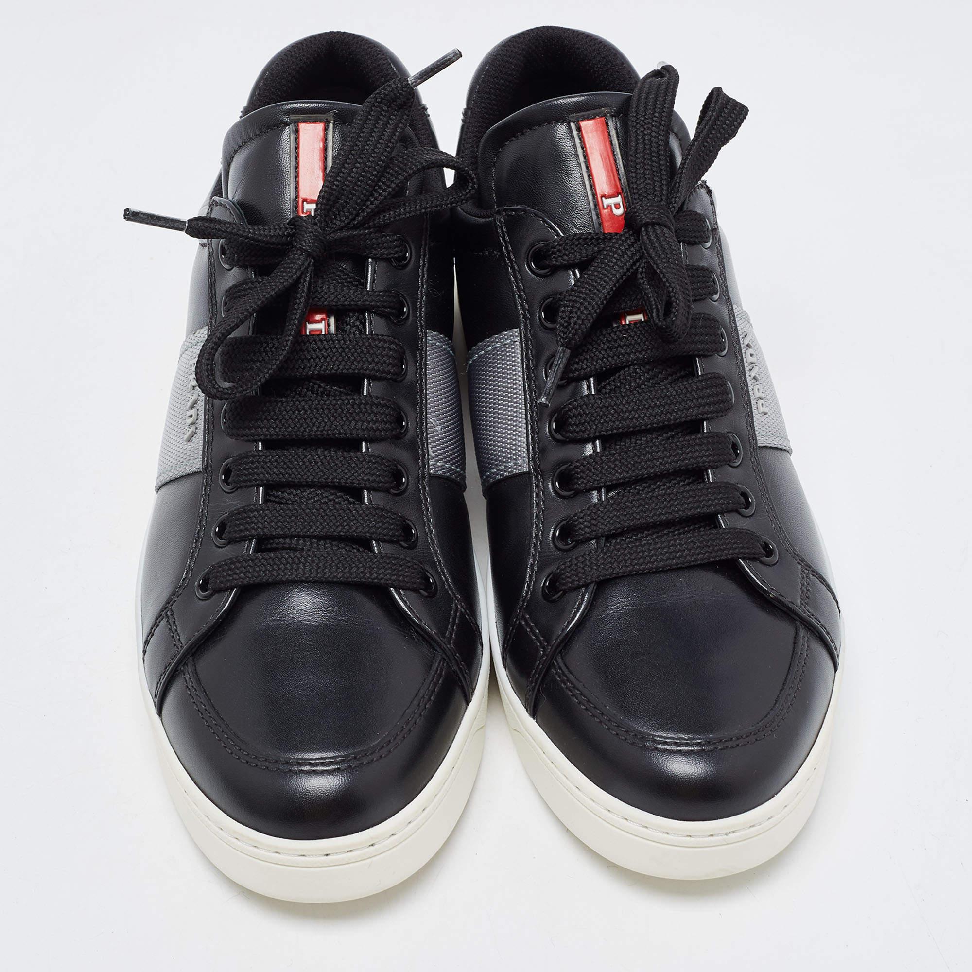 Coming in a classic silhouette, these Prada sneakers are a seamless combination of luxury, comfort, and style. These sneakers are designed with signature details and comfortable insoles.

