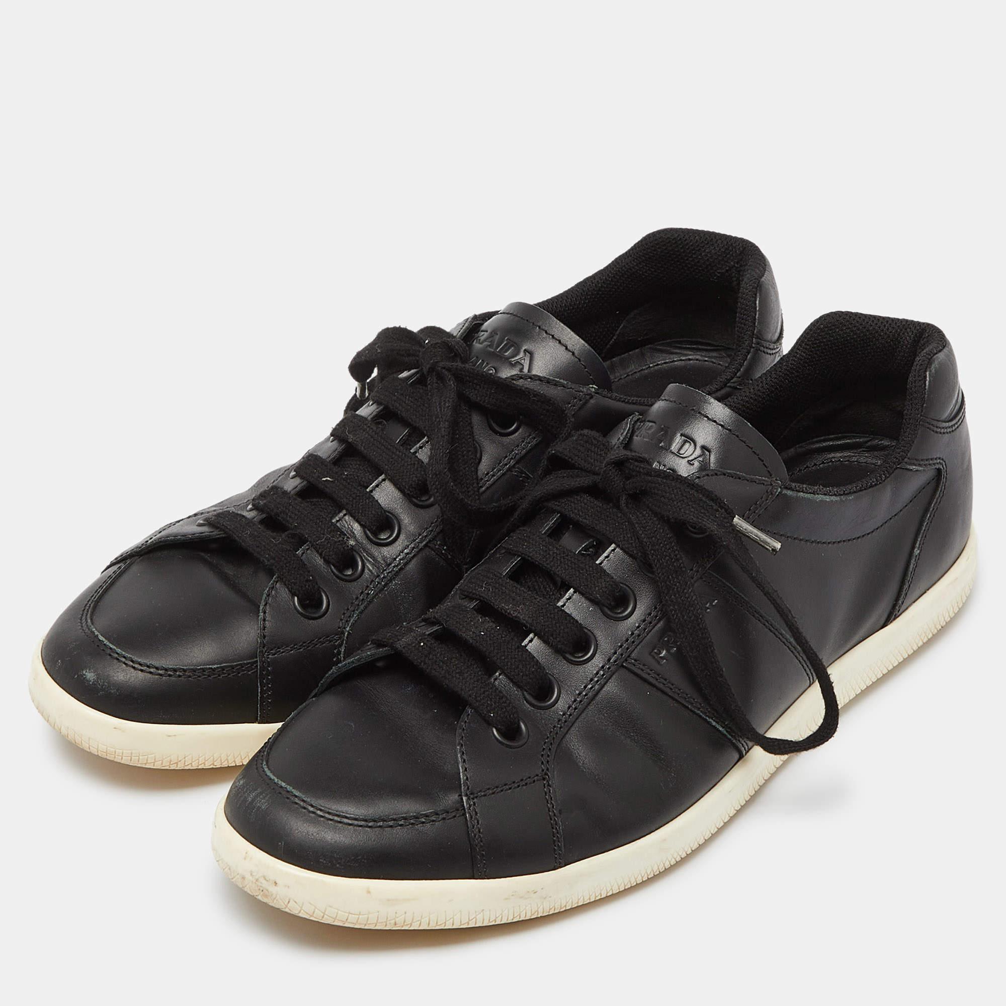 Elevate your footwear game with these Prada sneakers. Combining high end aesthetics and unmatched comfort these sneakers are a symbol of modern luxury and impeccable taste.