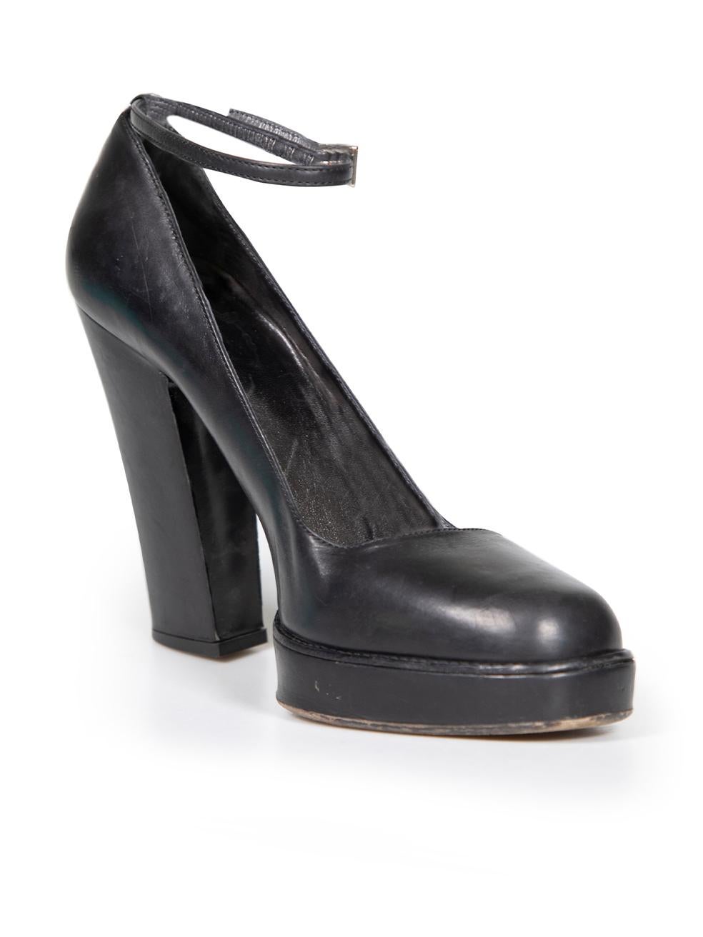 CONDITION is Good. General wear to heels is evident. Moderate signs of creasing to overall leather, as well as scratches and indent to top and heel of both shoes on this used Prada designer resale item.
 
 Details
 Black
 Leather
 Mary Jane heels
