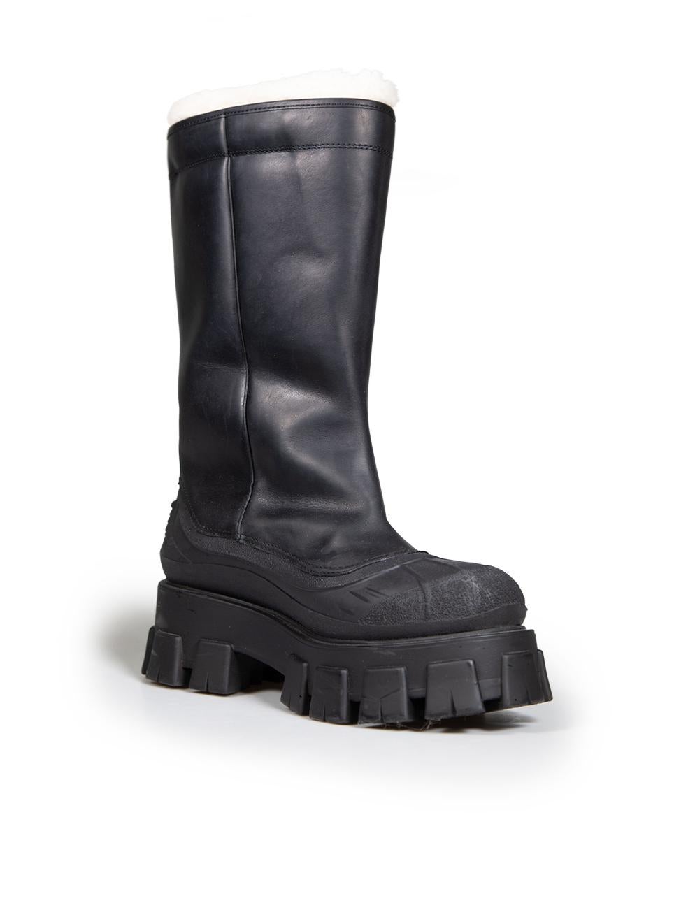 CONDITION is Very good. Minimal wear to the boots is evident. There is general creasing to the leather around the ankle of the boots and slight water marks to the sole of these boots on this used Prada designer resale item.
 
 
 
 Details
 
 
