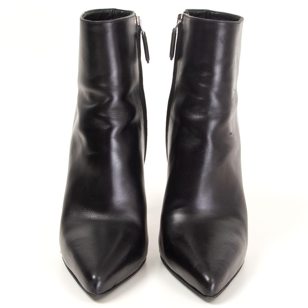100% authentic Prada pointed-toe high-heel ankle-boots in black calfskin. Open with a zipper on the inside. Have been worn and are in excellent condition.

Measurements
Imprinted Size	37.5
Shoe Size	37.5
Inside Sole	25cm (9.8in)
Width	7.5cm
