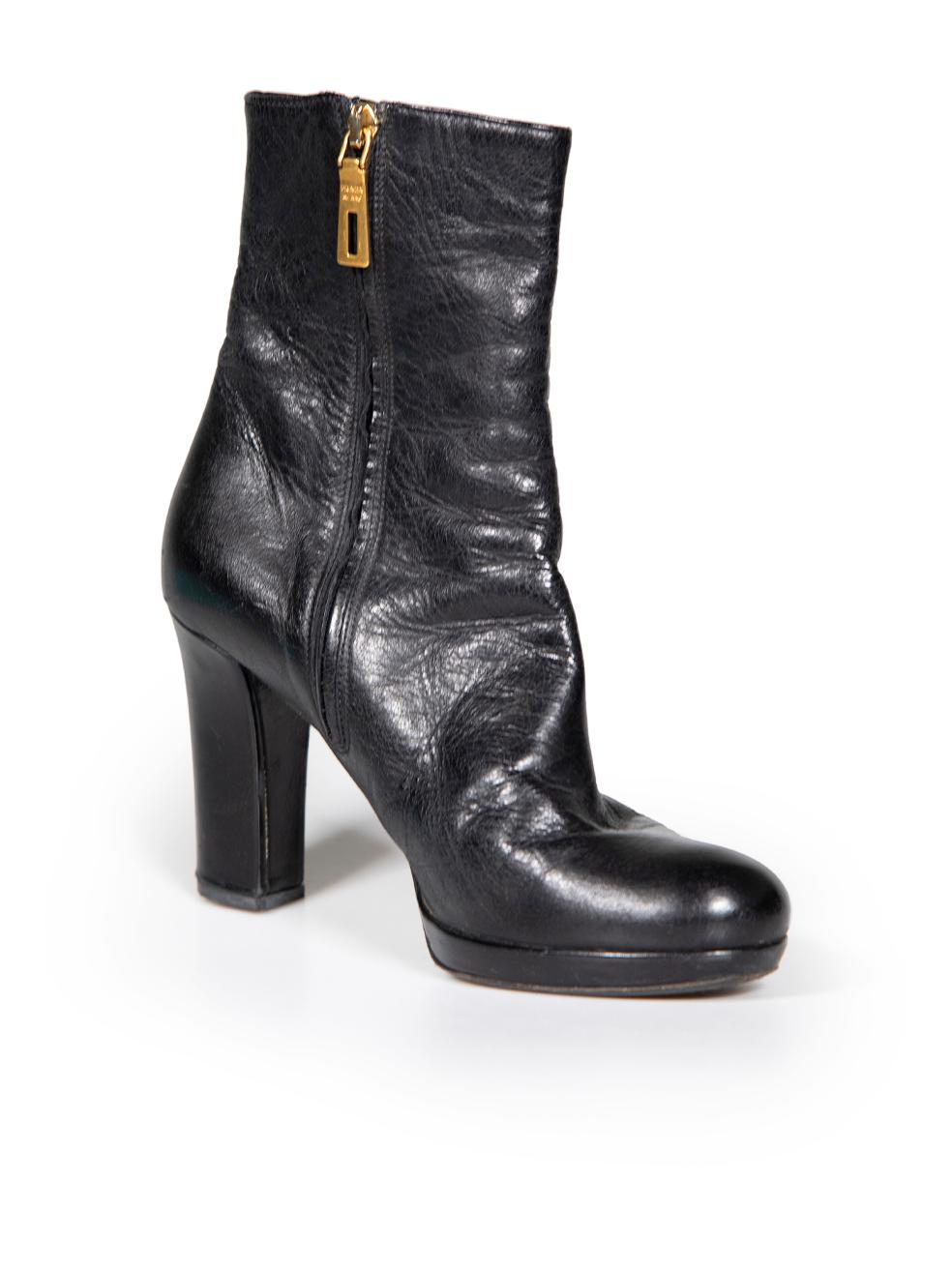 CONDITION is Very good. Minimal wear to boots is evident. Minimal creasing to the overall leather and slight abrasion to back of both heel. A black paint mark can be seen to the zip of right shoe on this used Prada designer resale item. These shoes
