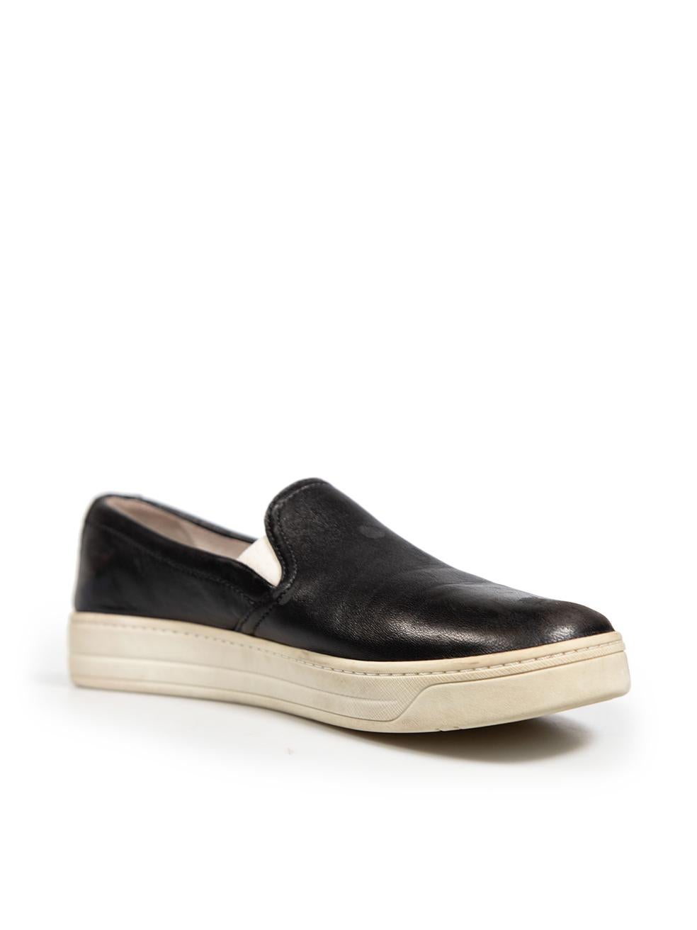 CONDITION is Good. General wear to the shoes is evident. Marks are found on the elasticated parts to the upper of both shoes. General creasing to the leather and wear to the toe caps on both shoes. Abrasion to the leather on the right shoe below the